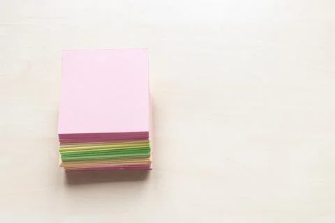 Stacks of blank colorful sheets of note paper Stock Photos