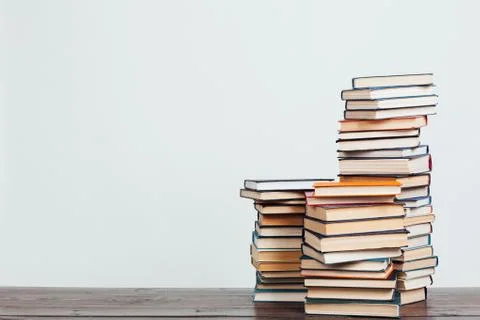Stacks of books for education knowledge in the school library on a white Stock Photos