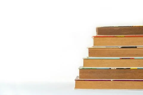 Stacks of books on isolate white background. Stock Photos