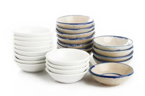 Stacks of Bowls on White Background Stock Photos
