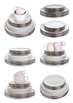 Stacks of ceramic plates and cups isolated on white, set Stock Photos
