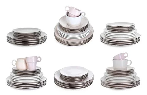 Stacks of ceramic plates and cups isolated on white, set Stock Photos
