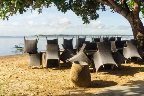 Stacks of chairs on the beach Stock Photos