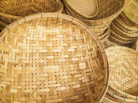Stacks of circular woven cane baskets Stock Photos