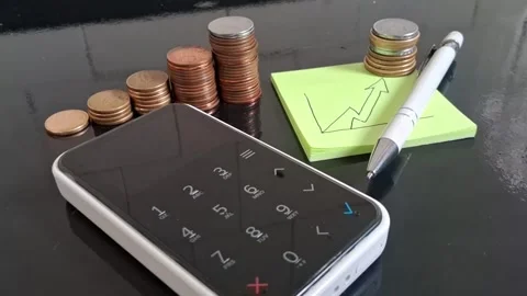 Stacks of coins and growth chart video showing financial progress Stock Footage 345162964