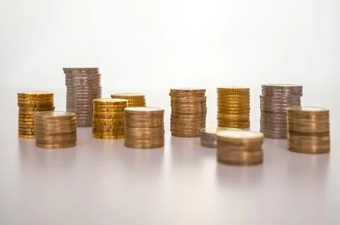 Stacks of coins close together. Stock Photos