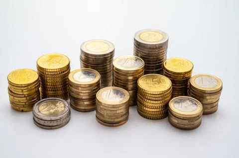 Stacks of coins close together. Stock Photos