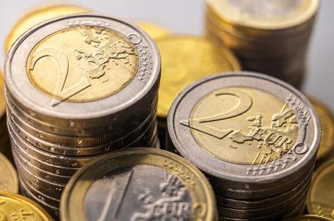 Stacks of coins close together. Stock Photos