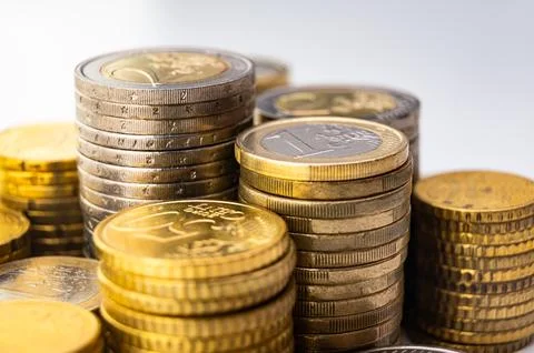 Stacks of coins close together. Stock Photos