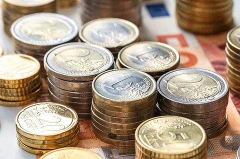 Stacks of coins close together. Stock Photos