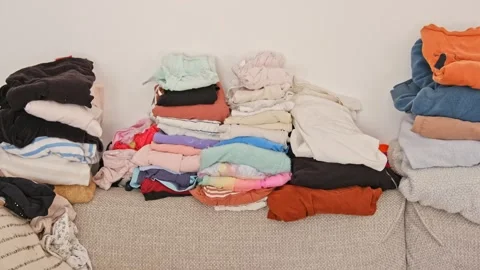 Stacks of Colorful Folded Laundry Clothes Stock Footage 269500265