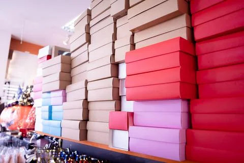 Stacks of colour cardboard boxes in the gift shop 写真素材