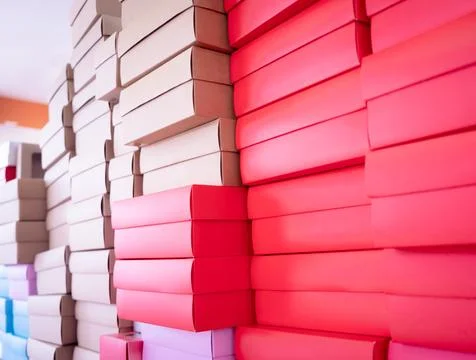 Stacks of colour cardboard boxes in the gift shop 库存照片