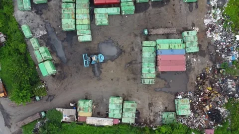 Stacks of containers stacked at a container terminal mixed with piles of ga.. Stock Footage 295484402