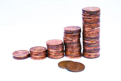 Stacks of copper coins increasing in height Stock Photos