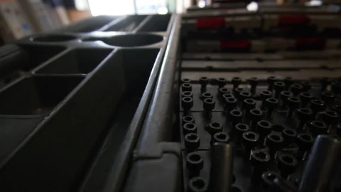 Stacks of desktop cnc mill and lathe parts on a cart in slow motion Stock Footage 119050773