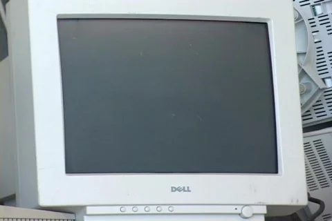 Stacks of discarded computer screens and monitors fill a storage Stock Footage 341042