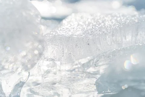 Stacks of drift ice piled up against the dutch coast with crystal clear sunli Stock Photos