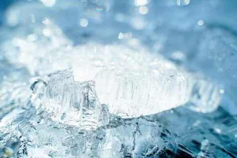 Stacks of drift ice piled up against the dutch coast with crystal clear sunli Stock Photos
