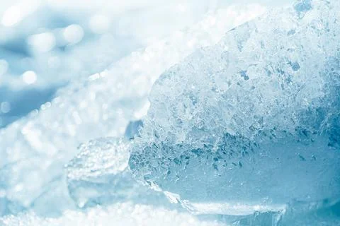Stacks of drift ice piled up against the dutch coast with crystal clear sunli Stock Photos