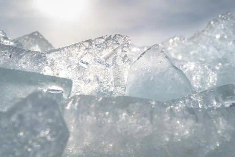 Stacks of drift ice piled up against the dutch coast with crystal clear sunli Stock Photos