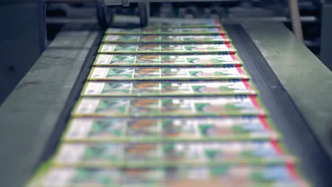 Stacks of magazines at a print office, close up. Stock Footage