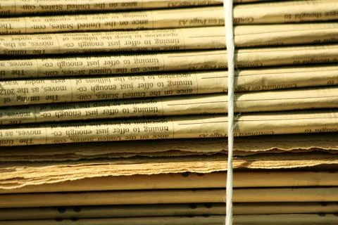 Stacks of newspapers background Stock Photos