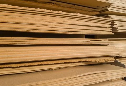 Stacks of old MDF of poor quality Stock Photos