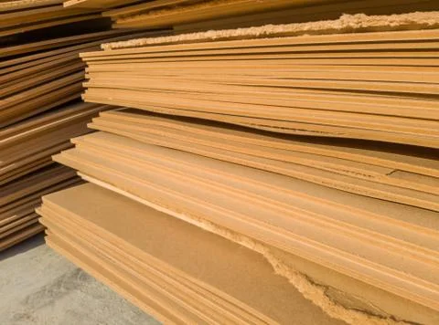 Stacks of old MDF of poor quality Stock Photos