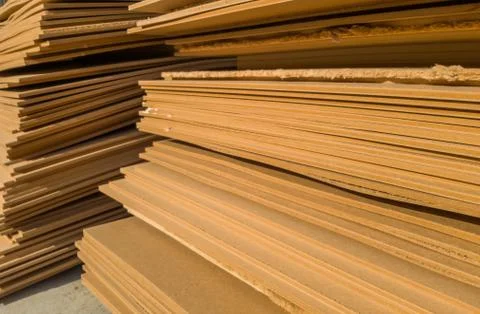 Stacks of old MDF of poor quality Stock Photos