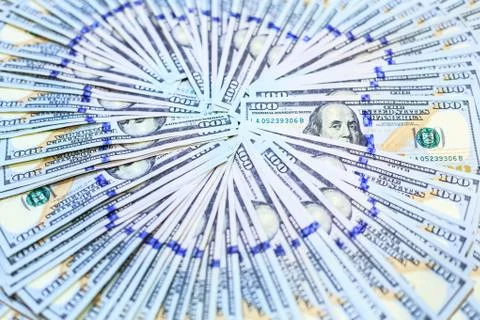 Stacks of One Hundred Dollars notes fans in circle pattern, New Design of 100 Stock Photos