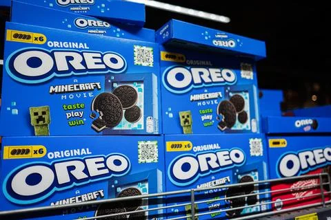 Stacks of Oreo boxes featuring Minecraft promotional packaging in a supermark 写真素材