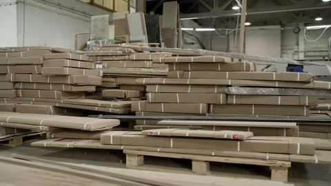 Stacks of packaged goods on pallets in a warehouse Stock Footage 327124750
