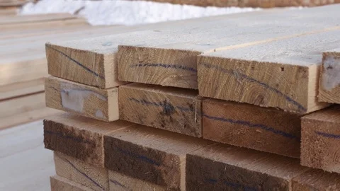 Stacks of packed lumber plank lying in yard of woodwork production Vídeo Stock 85212603