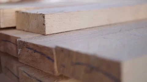 Stacks of packed lumber plank stored in yard of woodwork facility Stockbeeldmateriaal 85212617