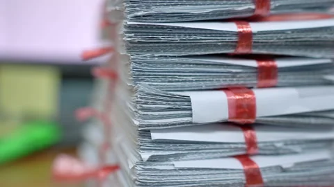 Stacks of paper files work desk office. Stock Footage 224432443