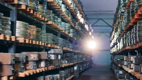 Stacks with plenty of antique movie cases Vídeo Stock 158358847