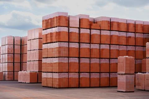 Stacks of Red Clay Bricks in an Industrial Material Yard in Germany Stock Photos