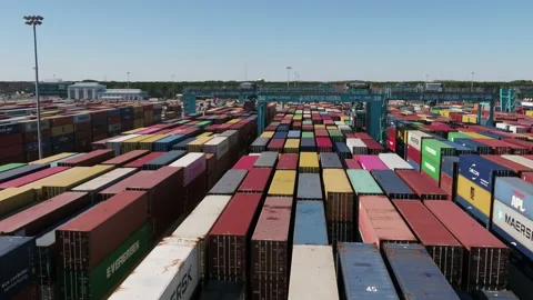 Stacks of shipping containers and cranes Stock Footage 171588909