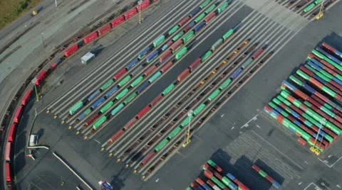 Stacks of Shipping Containers in Freight Harbor and Railyard Stock Footage 11633912