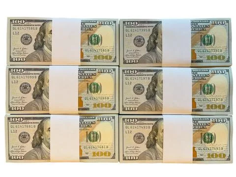 Stacks of US dollar bills isolated on on a white background Stock Photos