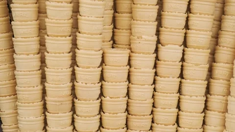 Stacks of waffle crispy ice cream cones. Abstract food texture background Stock Footage 256240914
