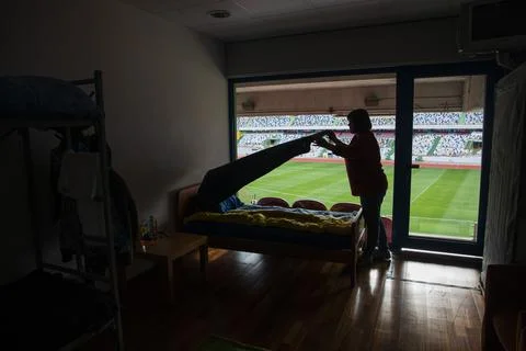 Stadium box converted into a bedroom to accommodate Ukrainian refugees, Leiria,  Stock Photos