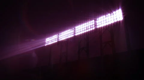 Stadium floodlights shining brightly and turning on and off. Purple. 5 in 1. Stock Footage 59585059