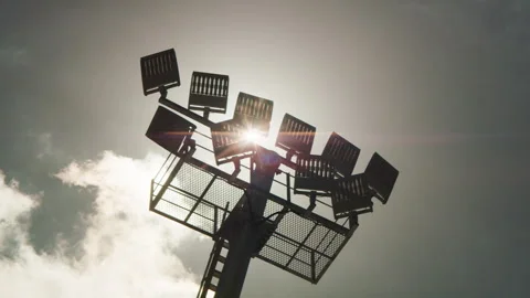 Stadium Lamp Post and Clouds with sun Flare Stock Footage 262316424