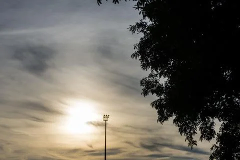 Stadium light pole with sunset Stock Photos