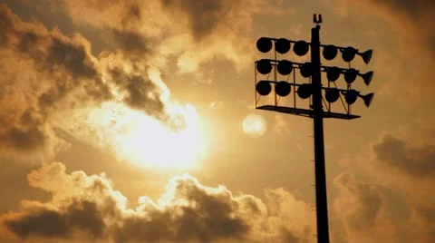 Stadium Light Silhouette in Front of Clouds Timelapse Stock Footage 12592912