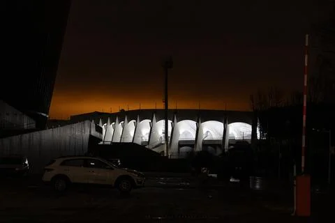 Stadium lighting at night. White lighting of the old stadium in Minsk Stock Photos