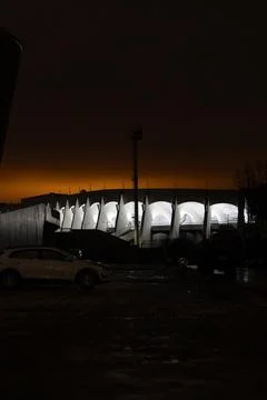 Stadium lighting at night. White lighting of the old stadium in Minsk Stock Photos