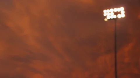 Stadium Lights Orange Sky Background Stock Footage 12589904